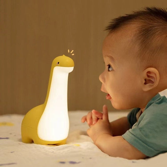 Cute Dinosaur Night Light – Eye-friendly, USB Rechargeable, Children's Room Decor.